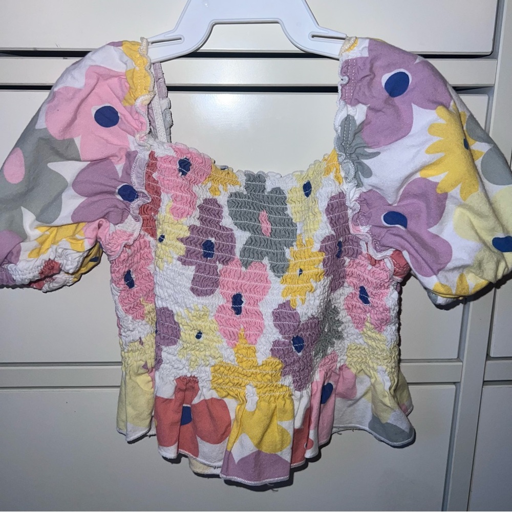 Flower print smocked peplum blouse